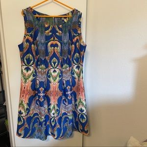 Blue Cocktail Dress with bold pattern and pockets!